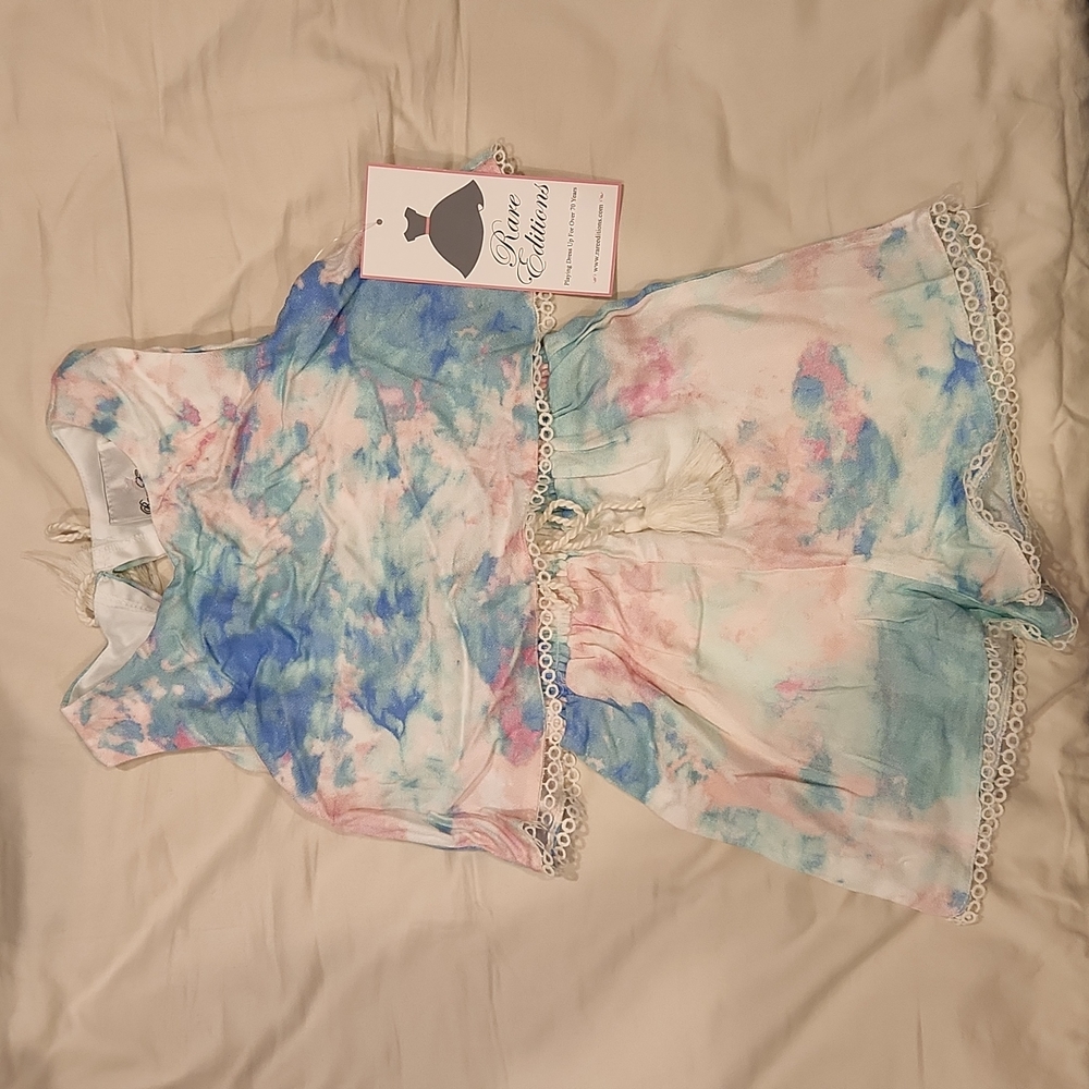 Nwt romper. Open back